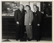 10 x 8 Glossy Photo From 1939, Featuring Curly, Moe & Larry Standing in Front of a 3 Stooges Poster -- Label on Verso Reads on tour in Fallriver, Mass. -- Double-Weight Photo Is Very Good